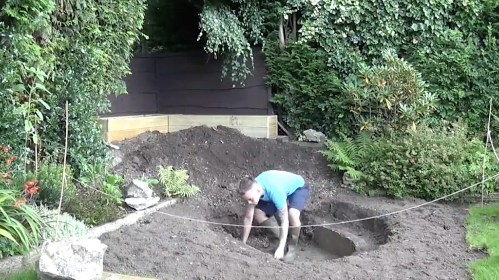 Removing rocks from a pond build